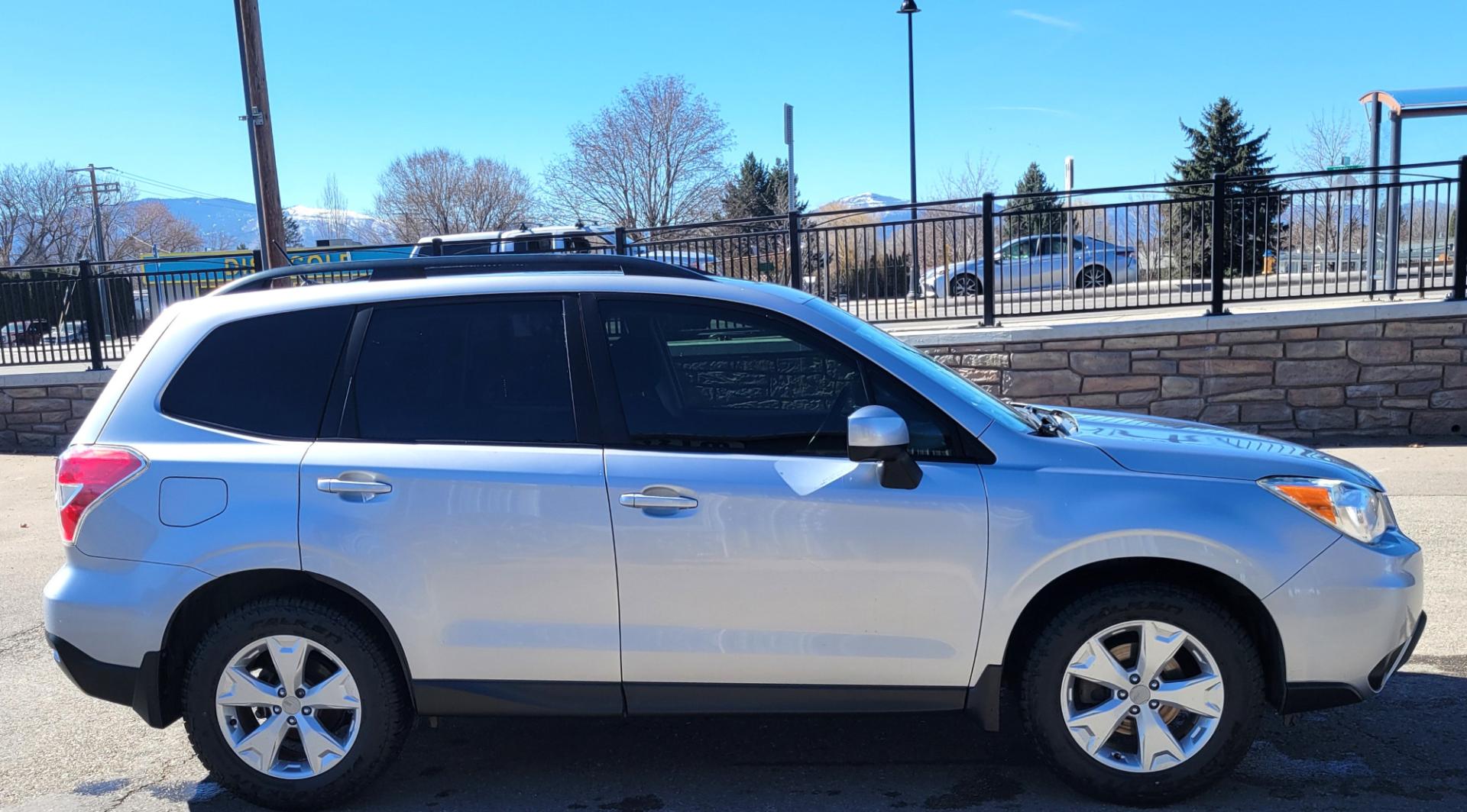 2015 Silver /Black Subaru Forester Premium (JF2SJADC3FH) with an 2.5L H4 engine, Automatic transmission, located at 450 N Russell, Missoula, MT, 59801, (406) 543-6600, 46.874496, -114.017433 - Photo#4